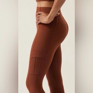 Athleta Salutation Stash Cargo 7/8 Tight in Burnt Sienna Medium